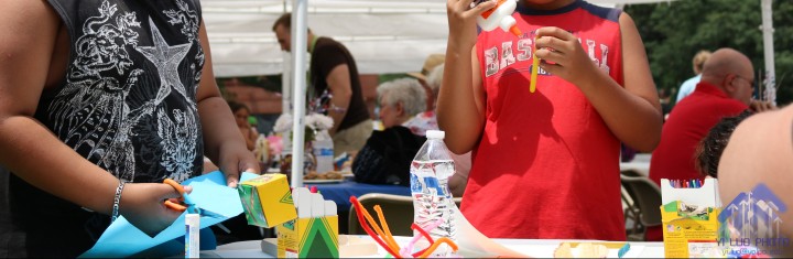 Young residents enjoy bubbles and crafts at the PoCo block party